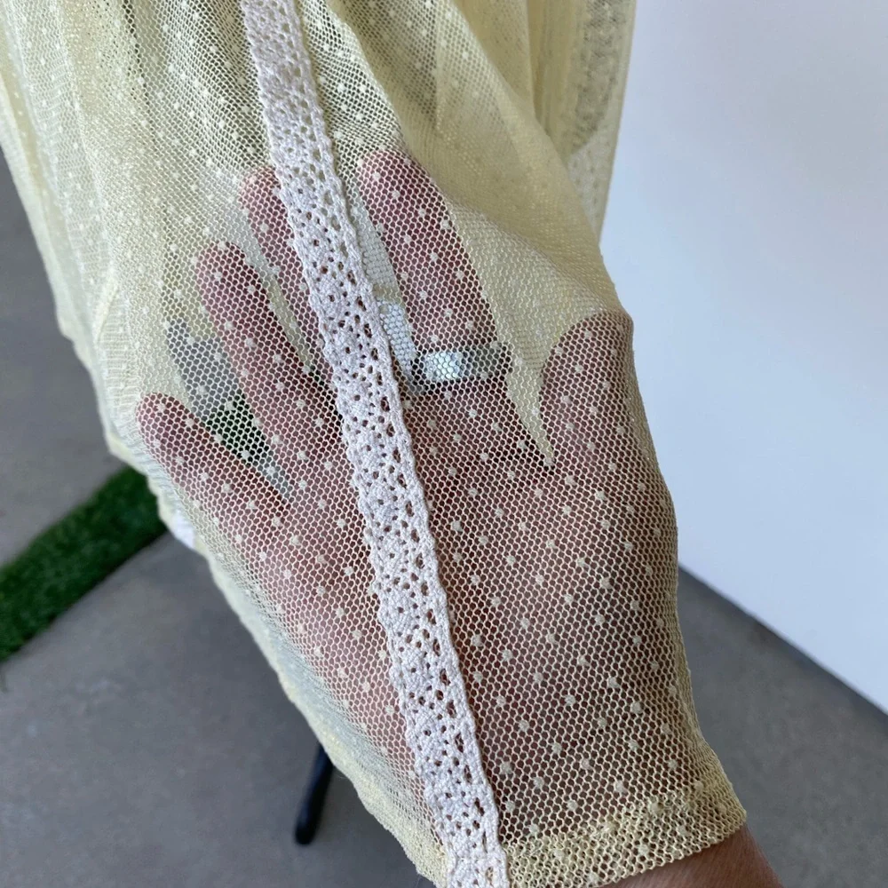 Elegant Cream Lace Dress by Free People size medium.